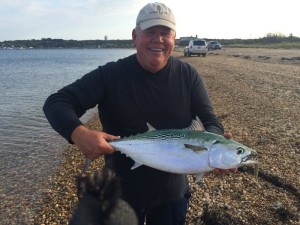 ALBIE DARNED: Verizon Charlie and his little tunny in Fort Pond Bay