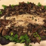 PAN ROASTED STRIPER: on a bed of mixed mushrooms and greens