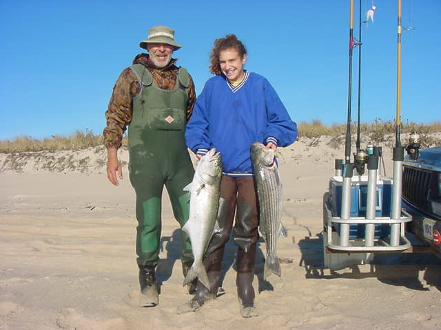 Diane's first striper was a keeper and she parlayed this catch with a gorilla bluefish the same size: 34 inches